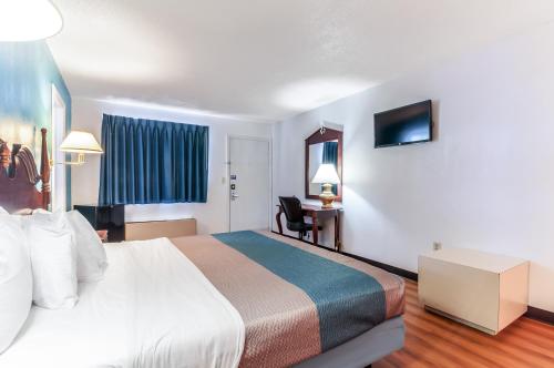 Ένα ή περισσότερα κρεβάτια σε δωμάτιο στο Motel 6-Southgate, MI - Detroit
