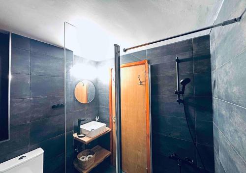 Koupelna v ubytování Vavatsinia Panorama Cottage