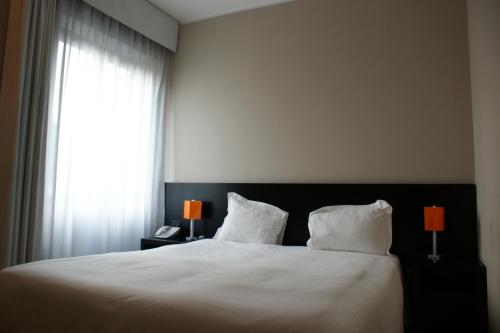 Cama o camas de una habitación en Hotel Aniene