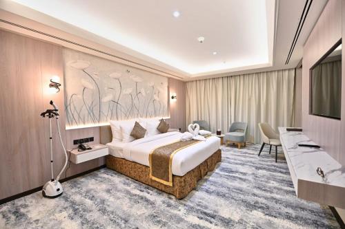 Postel nebo postele na pokoji v ubytování Pavilion Palace Hotel