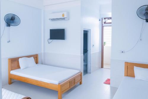 Postel nebo postele na pokoji v ubytování Phương Phương 1 Hotel