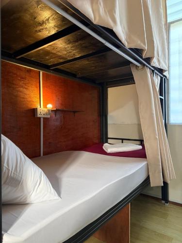 Postel nebo postele na pokoji v ubytování Anchor Point Hostel and Cafe