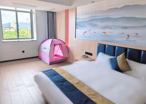 Postel nebo postele na pokoji v ubytování Wang Tian Shu Value Resort Hotel