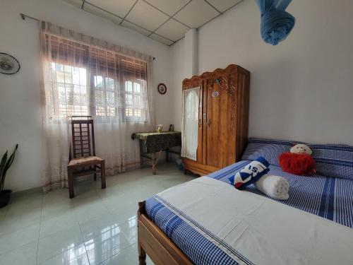 Ένα ή περισσότερα κρεβάτια σε δωμάτιο στο Green House No 02