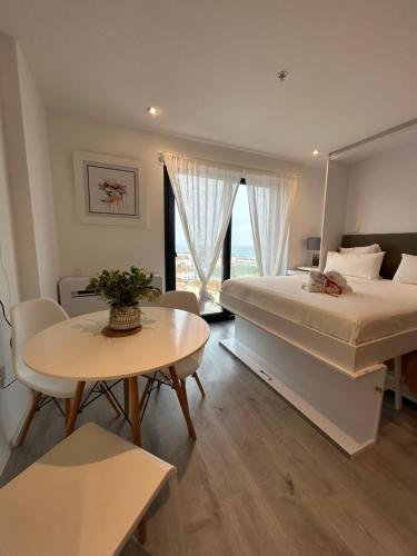 Ένα ή περισσότερα κρεβάτια σε δωμάτιο στο Hub Palace