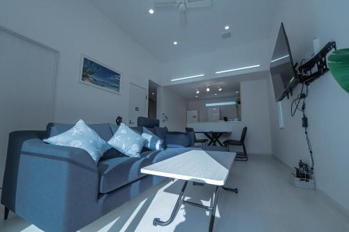 Et tv og/eller underholdning på ガーデンヴィラミヤコアネックスエー