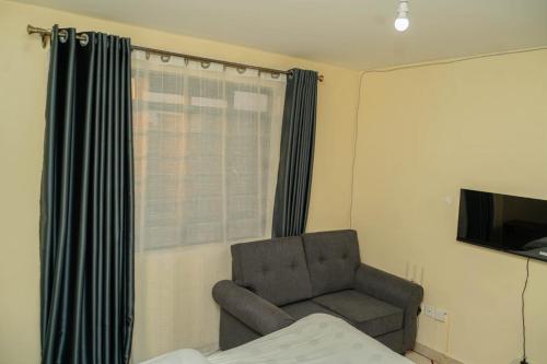 TV a/nebo společenská místnost v ubytování Safari Destination Homes