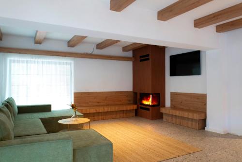 TV a/nebo společenská místnost v ubytování MonteRai