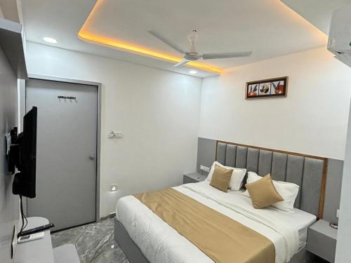 Postel nebo postele na pokoji v ubytování hotel sun pride