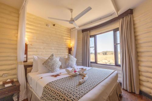 Postel nebo postele na pokoji v ubytování Salt Lick Safari Lodge