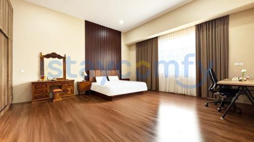 Giường trong phòng chung tại Large Villa Crown Hill Estate F26