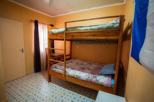 Postel nebo postele na pokoji v ubytování RUN'IX ATHLETIC CENTER