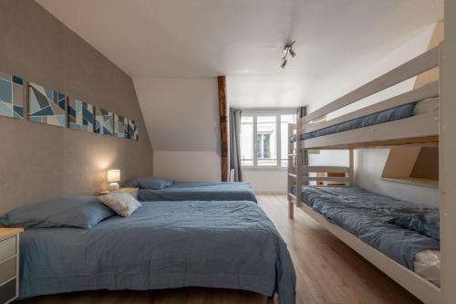 Postel nebo postele na pokoji v ubytování La Bignone - Avec jardin et terrasse