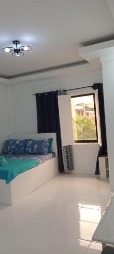 Carandang Tourist Inn客房内的一张或多张床位