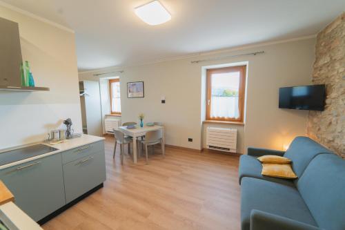 TV a/nebo společenská místnost v ubytování Corte Bonfiglio Colombari