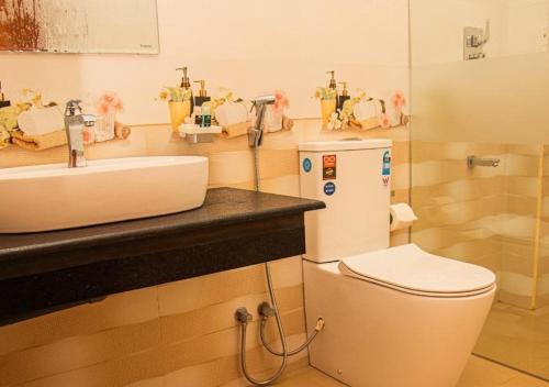 a bathroom with a sink and a toilet at Scenic View - Ella in Ella