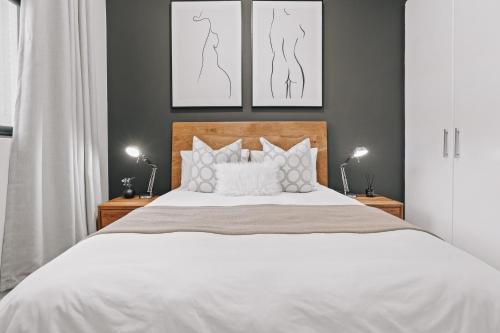 Кровать или кровати в номере 'Just Beachy' Muizenberg Beach Apartment