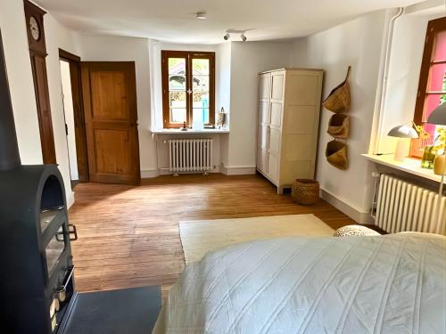 Postel nebo postele na pokoji v ubytování N2Quartier