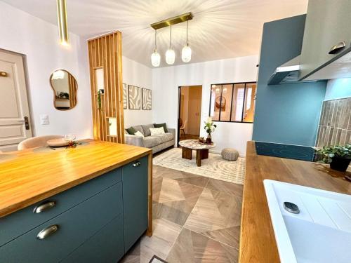 Kuchyň nebo kuchyňský kout v ubytování Le Sienna - Centre ville et gare