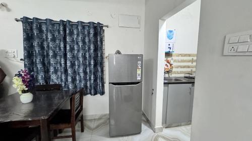 Kuchyň nebo kuchyňský kout v ubytování Sreeprada Homes