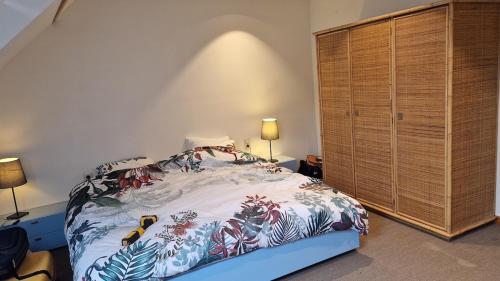 Ένα ή περισσότερα κρεβάτια σε δωμάτιο στο Small house in a historic and popular neighborhood