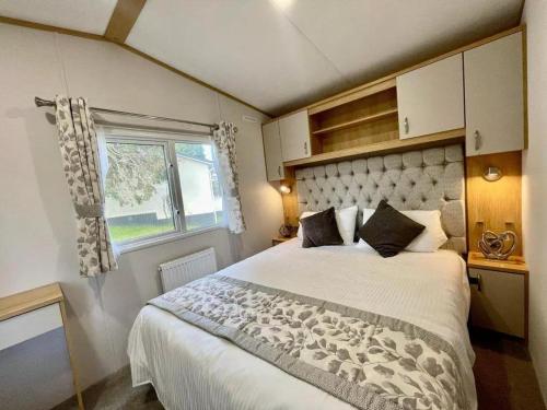 Voodi või voodid majutusasutuse Polperro Seaview Lodge toas