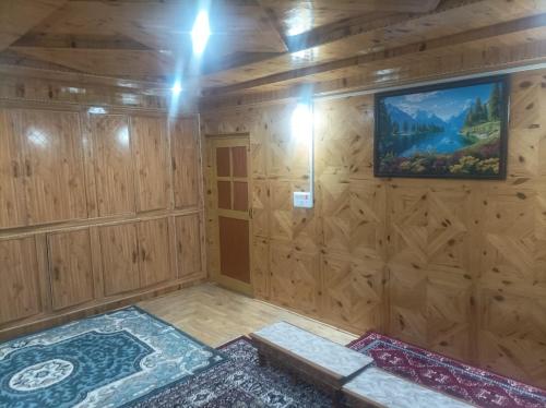 Voodi või voodid majutusasutuse Snow Peaks View Homestay toas