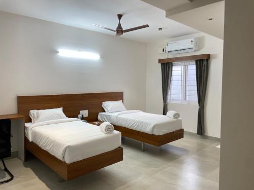 Ένα ή περισσότερα κρεβάτια σε δωμάτιο στο KK Service