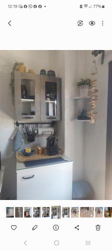 a kitchen with a white counter top in a room at The Island sea view apartment in Elounda