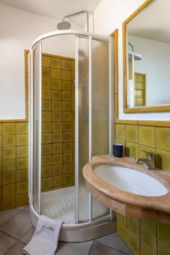 a bathroom with a sink and a shower at Da Nino sul mare Filicudi in Filicudi