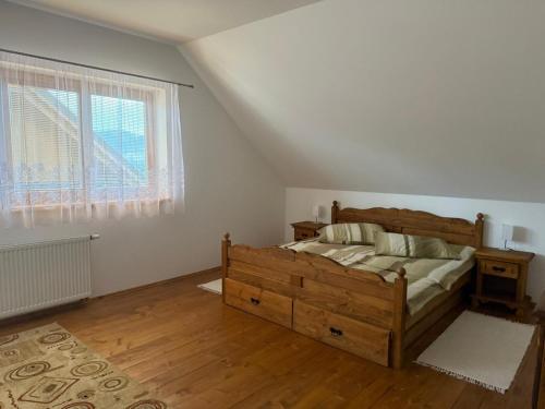 Ένα ή περισσότερα κρεβάτια σε δωμάτιο στο Chata Vločka - Orava Snow v lyžiarskom stredisku