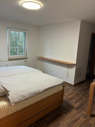 Postel nebo postele na pokoji v ubytování WohnService Apartment