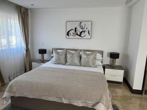 Ένα ή περισσότερα κρεβάτια σε δωμάτιο στο Imperial Grove 3BR at Cantonments