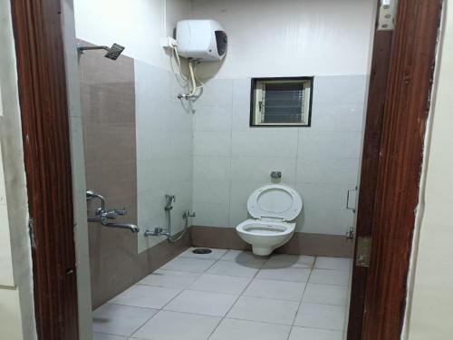 Koupelna v ubytování Hotel Krishna Exotica