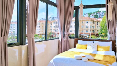 Postel nebo postele na pokoji v ubytování Lantana Homestay