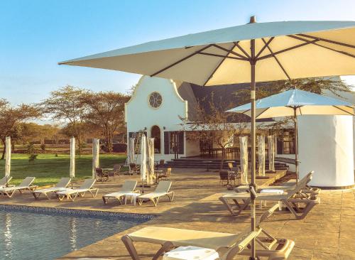 Πισίνα στο ή κοντά στο Kili Seasons Hotel