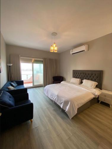 Postel nebo postele na pokoji v ubytování فيلا ساحل القمر-درة العروس