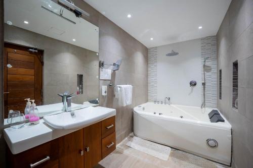 Ένα μπάνιο στο Blossom Villa Thalawathugoda