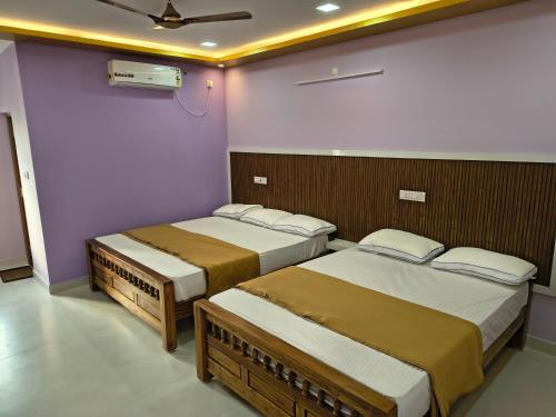 Postel nebo postele na pokoji v ubytování DS Guest House Rooms