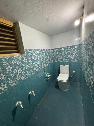 Ένα μπάνιο στο NPS Homestay