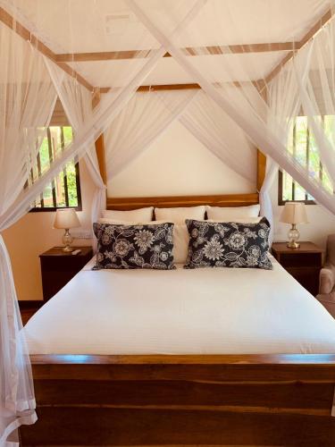 Ένα ή περισσότερα κρεβάτια σε δωμάτιο στο Well House