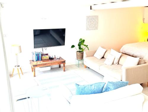 Posezení v ubytování The Retreat Studio