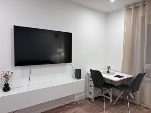 TV a/nebo společenská místnost v ubytování Heide-deluxe