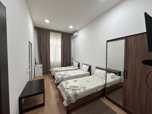 Postel nebo postele na pokoji v ubytování A-Hotel Ex Magistral