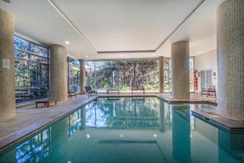 Bazén v ubytování PORTANOVA SUITES - Apartamento muy cómodo, a tan sólo 5 minutos del aeropuerto JMC nebo v jeho okolí