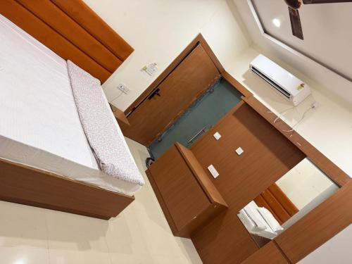 Ένα ή περισσότερα κρεβάτια σε δωμάτιο στο Hotel Grand Lucent Mathura-Vrindavan