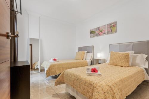 Postel nebo postele na pokoji v ubytování Apartamento Rolycar 103