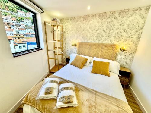 Ένα ή περισσότερα κρεβάτια σε δωμάτιο στο Gestviva Casa Urbanin III