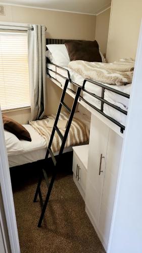 Ένα ή περισσότερα κρεβάτια σε δωμάτιο στο 105 elm walk