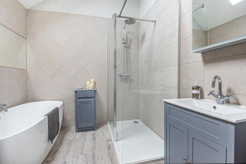 Vannituba majutusasutuses Olive's Cottage